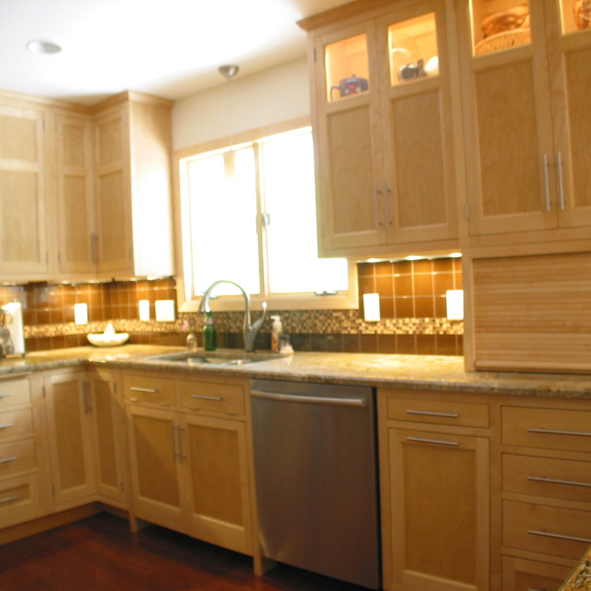 Custom cabinetry and kitchen remodel by Whole Builders